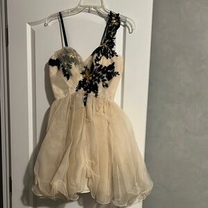 Elegant Cream Dress with Black Floral Appliqué
